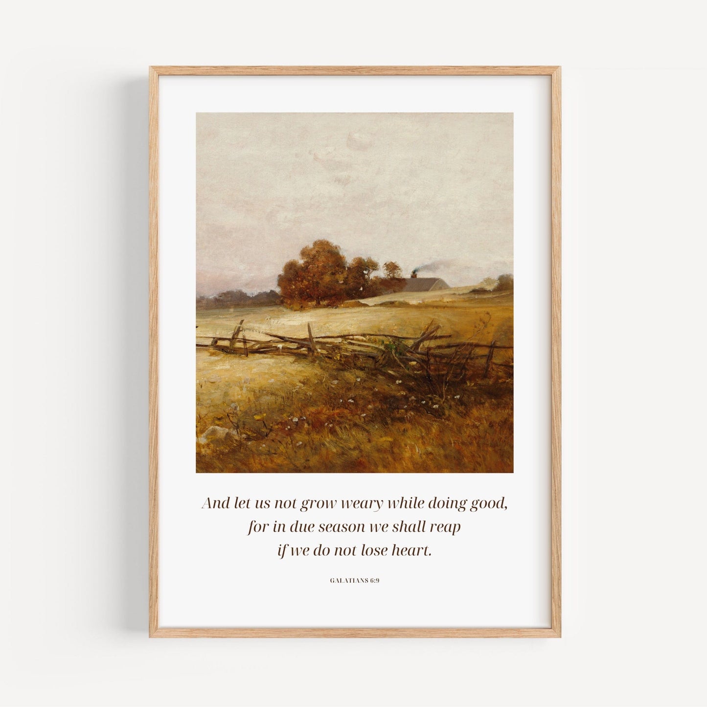 Framed artwork of a landscape with a quote on a white background