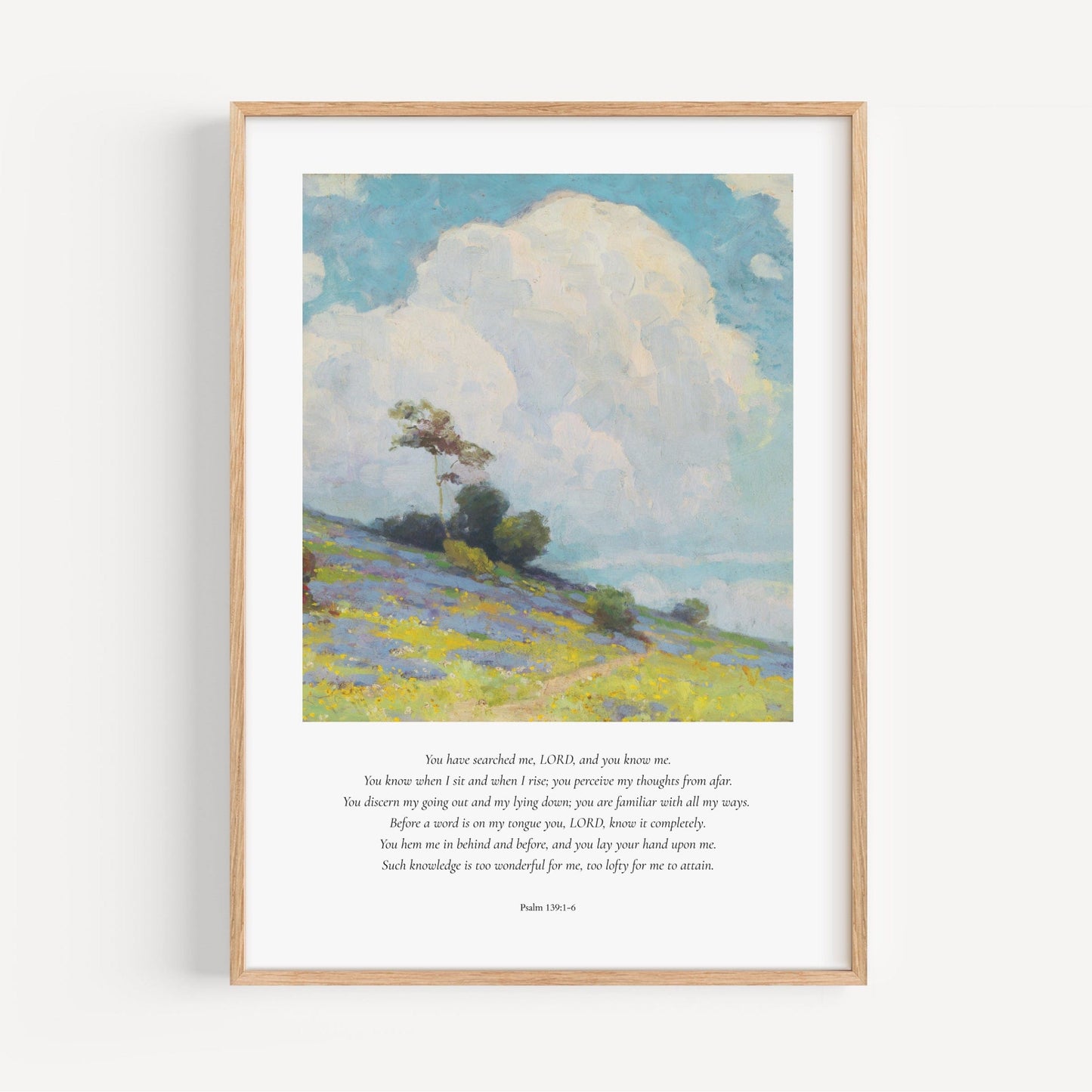 Framed artwork of a landscape with a tree and open field, featuring text on a white background.