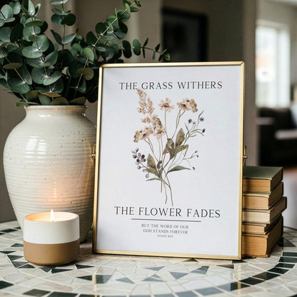 Framed botanical print with a candle and vase on a patterned surface