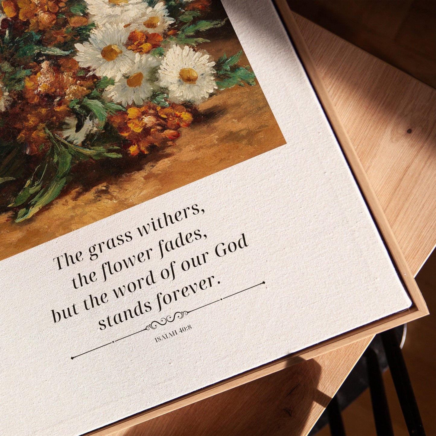 Floral painting with a biblical quote on a wooden surface