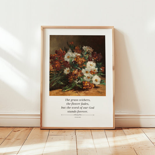 Framed artwork with floral arrangement and inspirational quote on a wall.