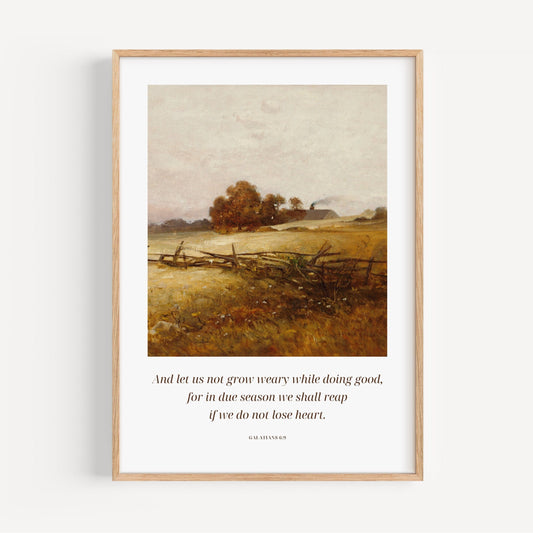 Framed artwork of a landscape with a quote on a white background