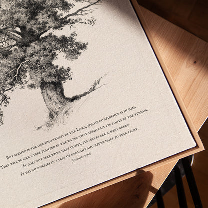 Print with a tree illustration and text on a wooden surface