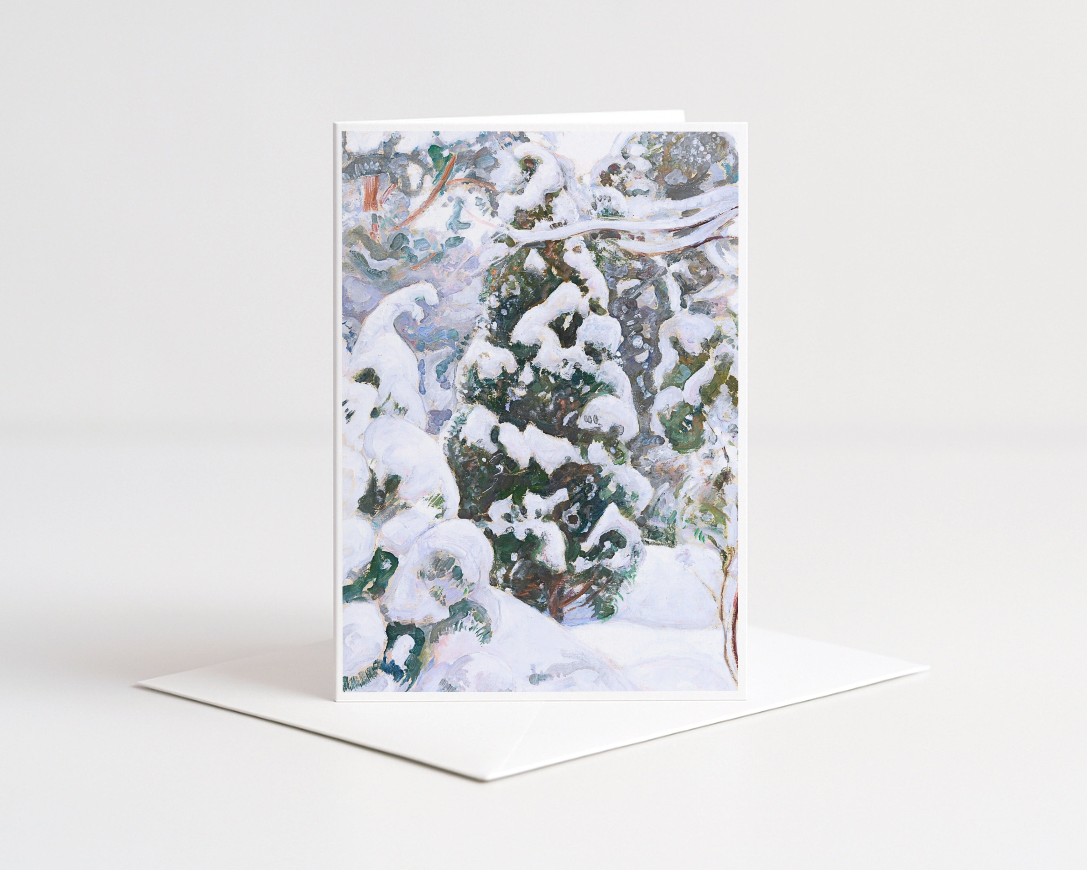 Greeting card with a snowy forest design on a white background
