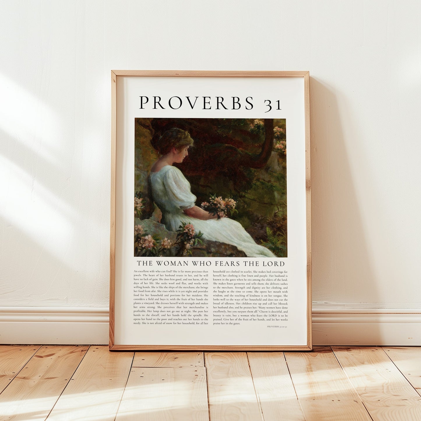 Framed artwork with a woman and text on a white wall