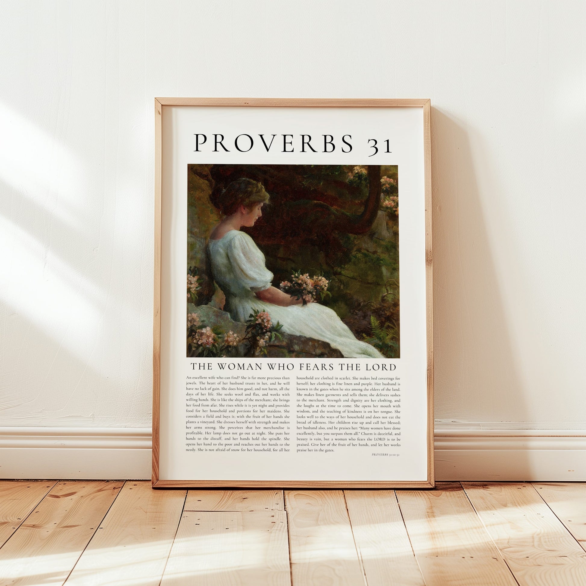 Framed artwork with a woman and text on a white wall