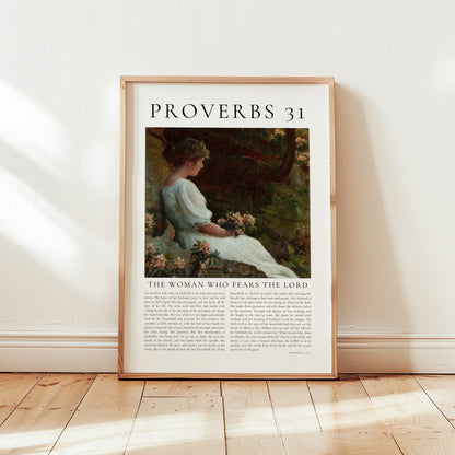 Framed artwork with a woman and text on a white wall