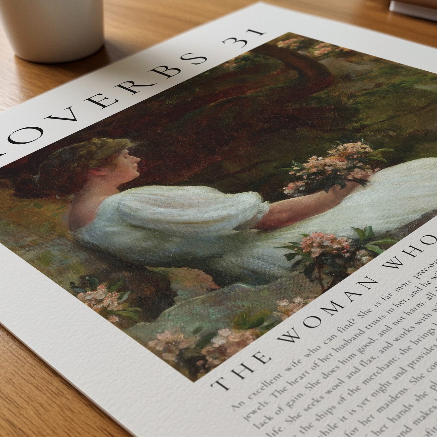 Art print of a woman holding flowers with text overlay on a wooden surface