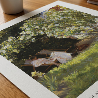 Print of a nature scene with flowers and birds on a wooden surface