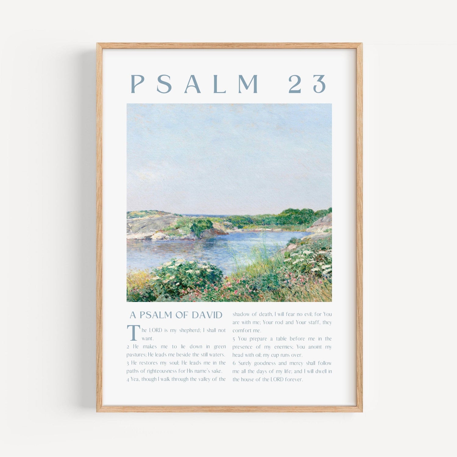 Framed artwork with a landscape scene and 'Psalm 23' text on a white background