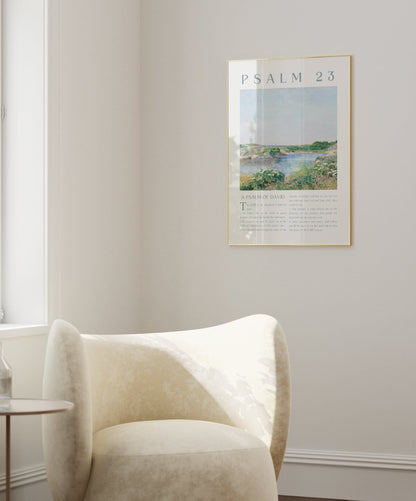 Modern living room with a white armchair, side table, and framed artwork on the wall.