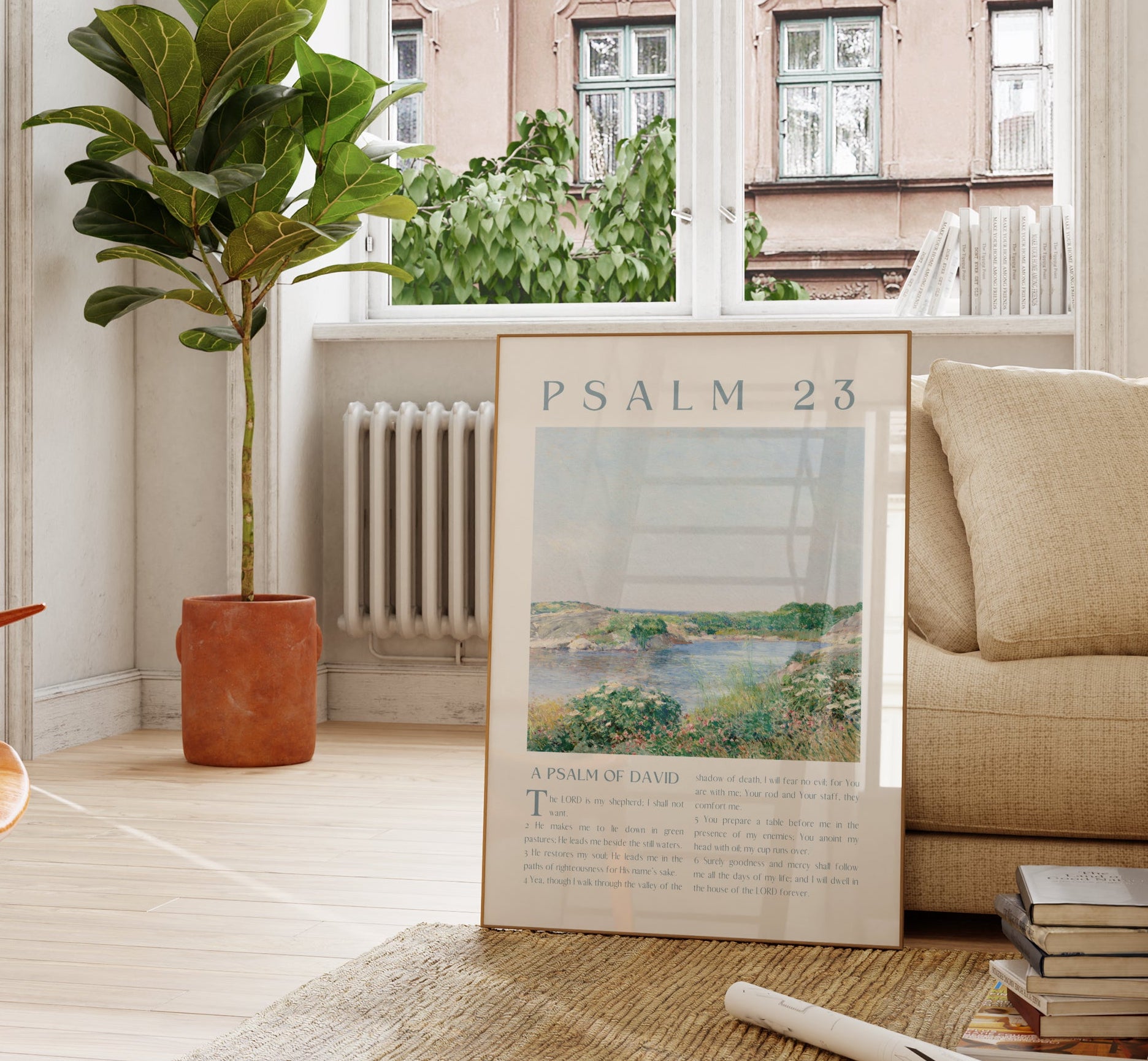 Living room with a beige sofa, wooden coffee table, and a plant near a window.
