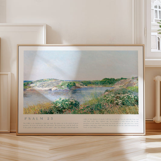 Framed artwork with a landscape scene and 'Psalm 23' text on a wall in a room with a radiator and window.