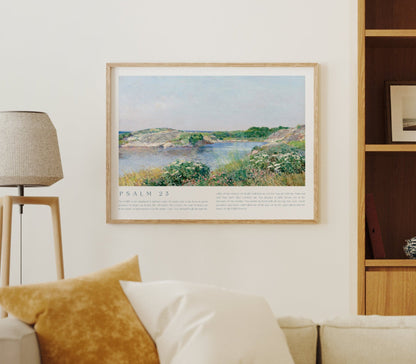 Living room with beige sofa, framed artwork, and wooden shelves.