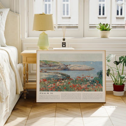 Framed artwork of a coastal scene with flowers in a bedroom setting
