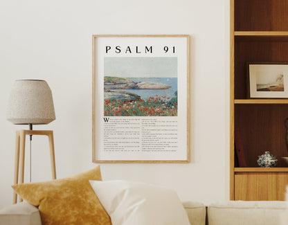 Living room with a beige sofa, lamp, and framed poster on the wall.
