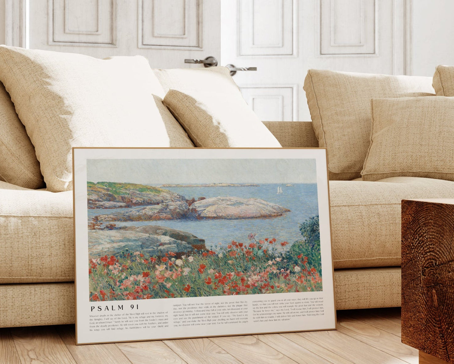 Beige sofa with a framed artwork of a nature scene in a living room.