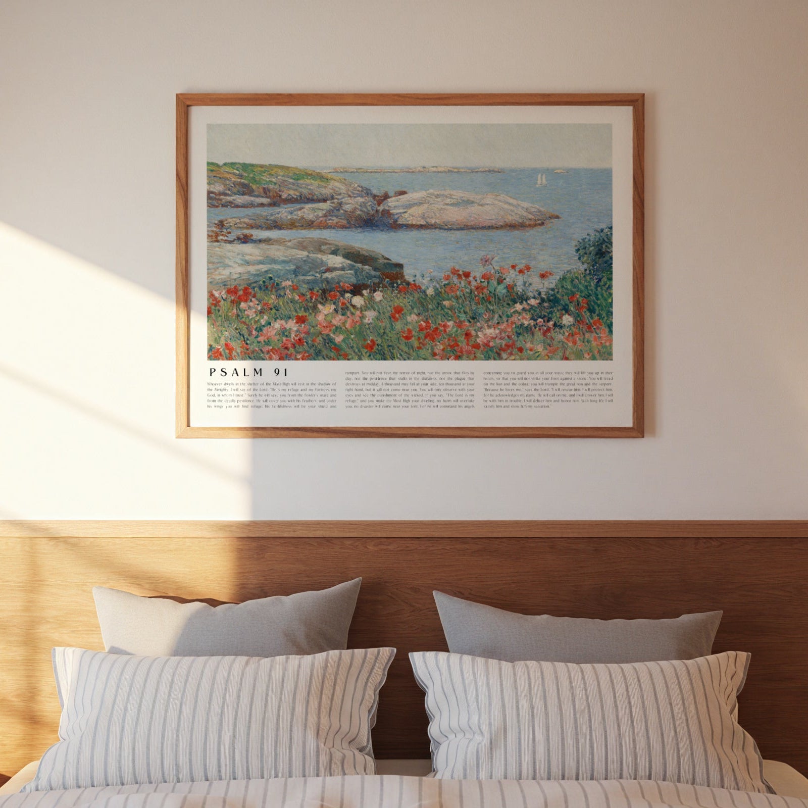 Bedroom with wooden headboard, striped bedding, and framed artwork on the wall.