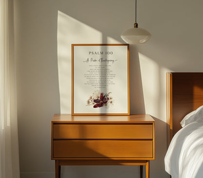 Wooden nightstand with framed artwork in a bedroom setting
