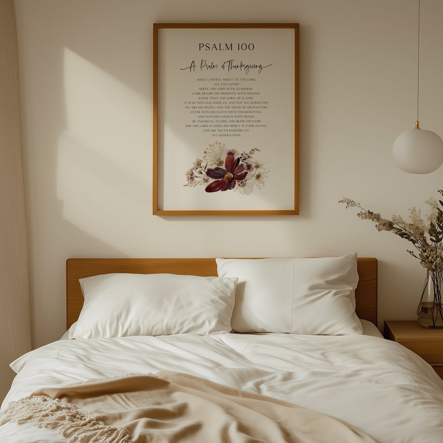 Bedroom with wooden headboard, white bedding, and framed artwork on wall.