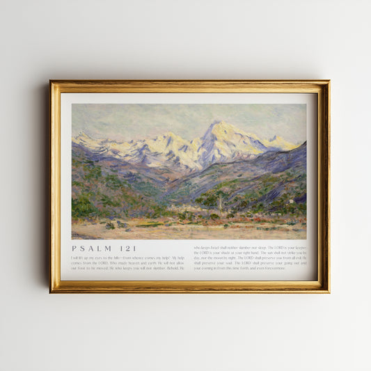 Framed artwork of a mountain landscape with 'Psalm 121' text on a plain wall.
