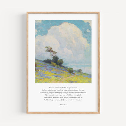 Framed artwork of a landscape with a tree and open field, featuring text on a white background.