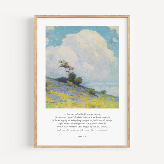 Framed artwork of a landscape with a tree and open field, featuring text on a white background.