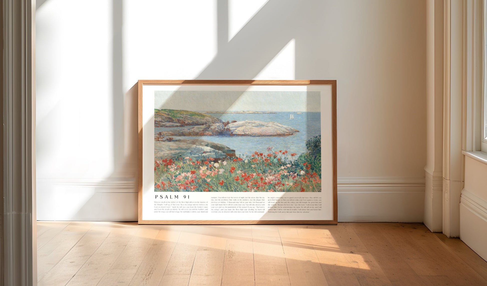 Framed artwork on a wall in a bright room with sunlight streaming through windows.